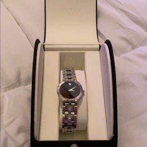 Movado Stainless Steel and Black Watch, GUC.